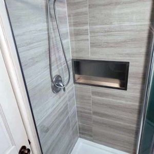 Stainless shower shelf, polished to blend, #4 Finish - Installed